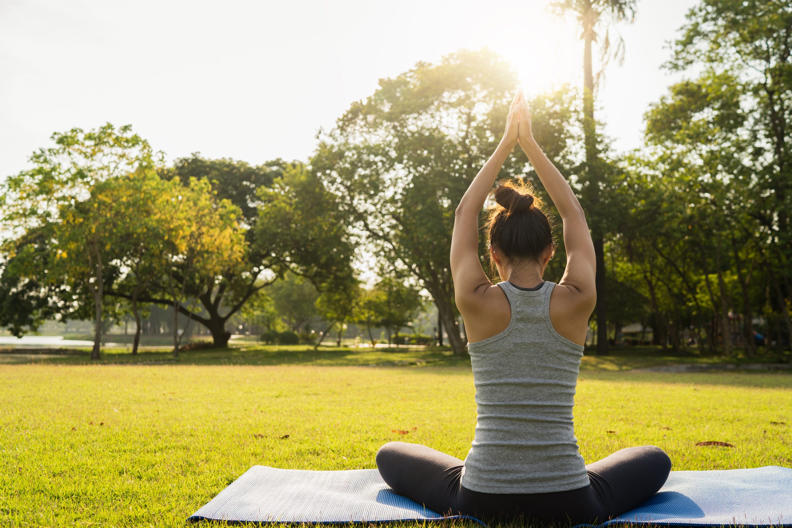 Young,Asian,Woman,Yoga,Outdoors,Keep,Calm,And,Meditates,While